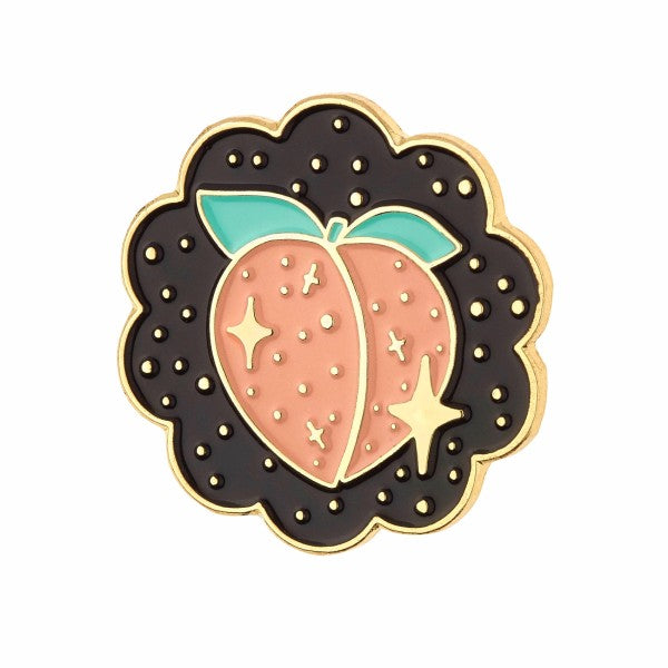 Peach-colored soft enamel badge pin with gold-plated accents, manufactured by Cooper, featuring a stylish and detailed design.