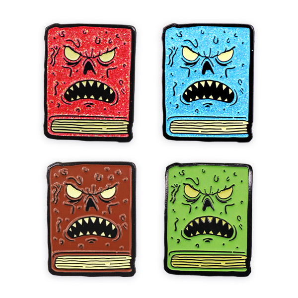 Soft enamel book pin badge featuring a novelty design, made by Cooper, with vibrant colors and detailed craftsmanship.