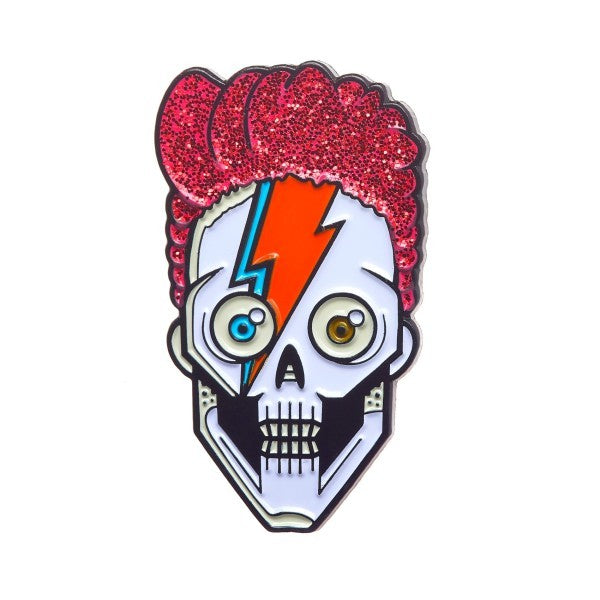 Soft enamel badge featuring a David Bowie skull design with glitter, made by Cooper for Pinlord.com.