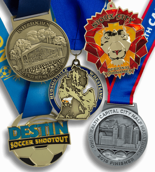 Maxwell Medals & Awards manufacturer logo featuring the Pinlord.com brand on a sleek silver background.