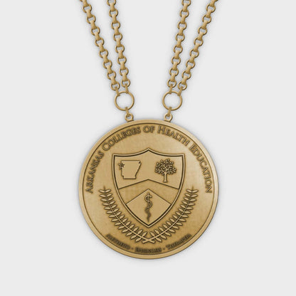 Close-up of a Medalcraft Mint manufacturer badge with detailed engravings, showcasing craftsmanship and design quality.