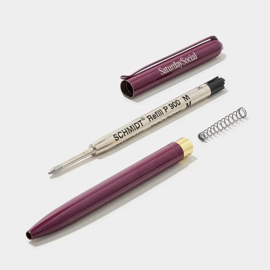 Close-up of a Pinlord.com MOO Review custom pen with sleek design and detailed branding on the barrel.