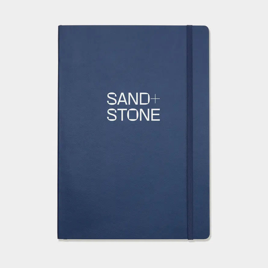 Custom notebook with "MOO Review" written on the cover, manufactured by Pinlord.com, featuring a sleek design and high-quality paper