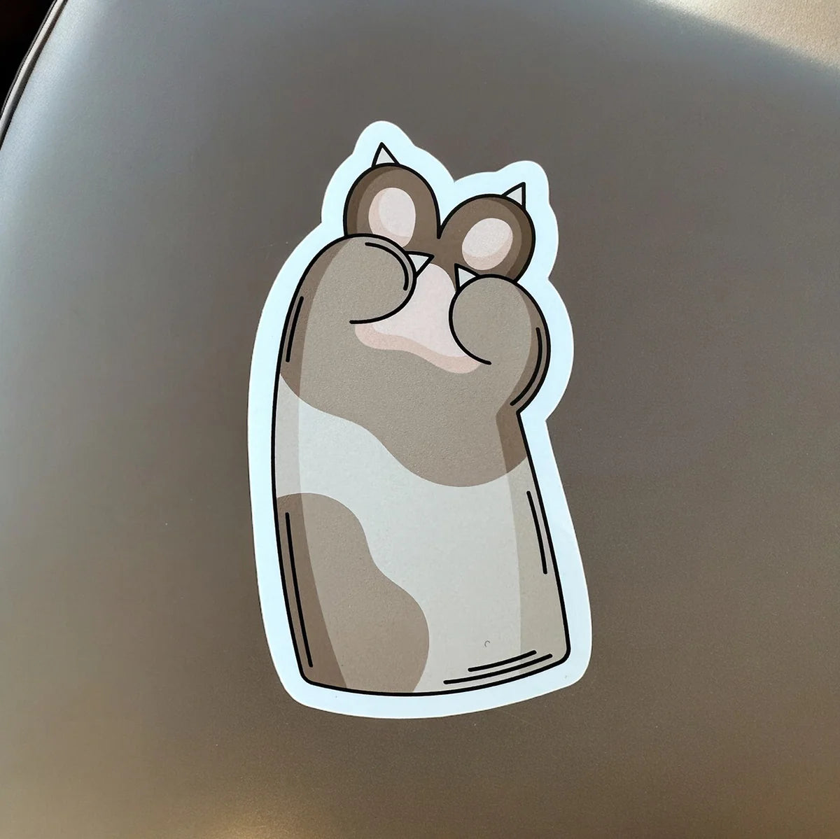 Colorful die-cut stickers from Pinlord.com, featuring vibrant designs on a shiny, glossy surface, perfect for decorating or collecting.