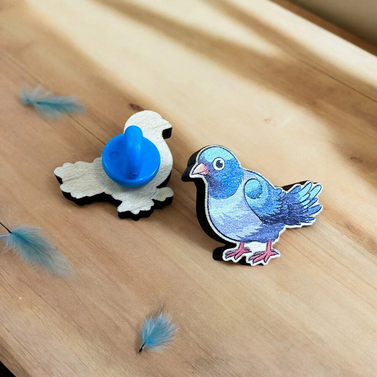 Eco-friendly enamel pin badges from Pinlord.com, showcasing colorful, detailed designs on a white background.