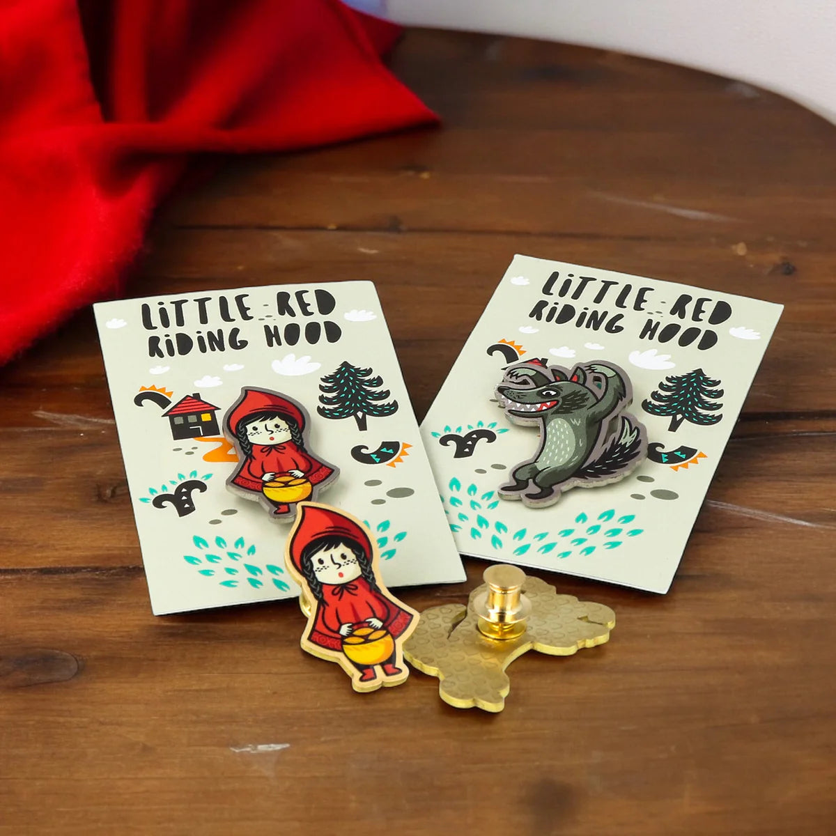 UK-made enamel pins by Pinlord.com, showcasing colorful, detailed enamel pin designs with a smooth finish.