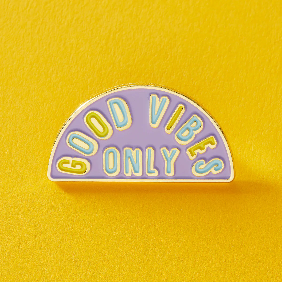 Close-up of a colorful enamel pin featuring punk-inspired design from Pinlord.com's PunkyPins series, mounted on a white background.