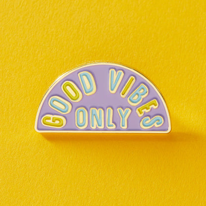 Close-up of a colorful enamel pin featuring punk-inspired design from Pinlord.com's PunkyPins series, mounted on a white background.