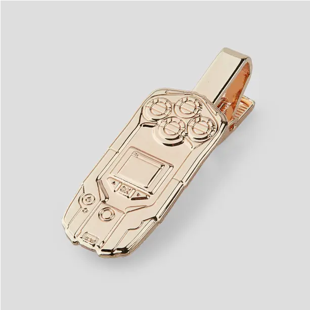 Close-up of THE/STUDIO Review manufacturer pin from Pinlord.com showing detailed design and branding on a metal pin.