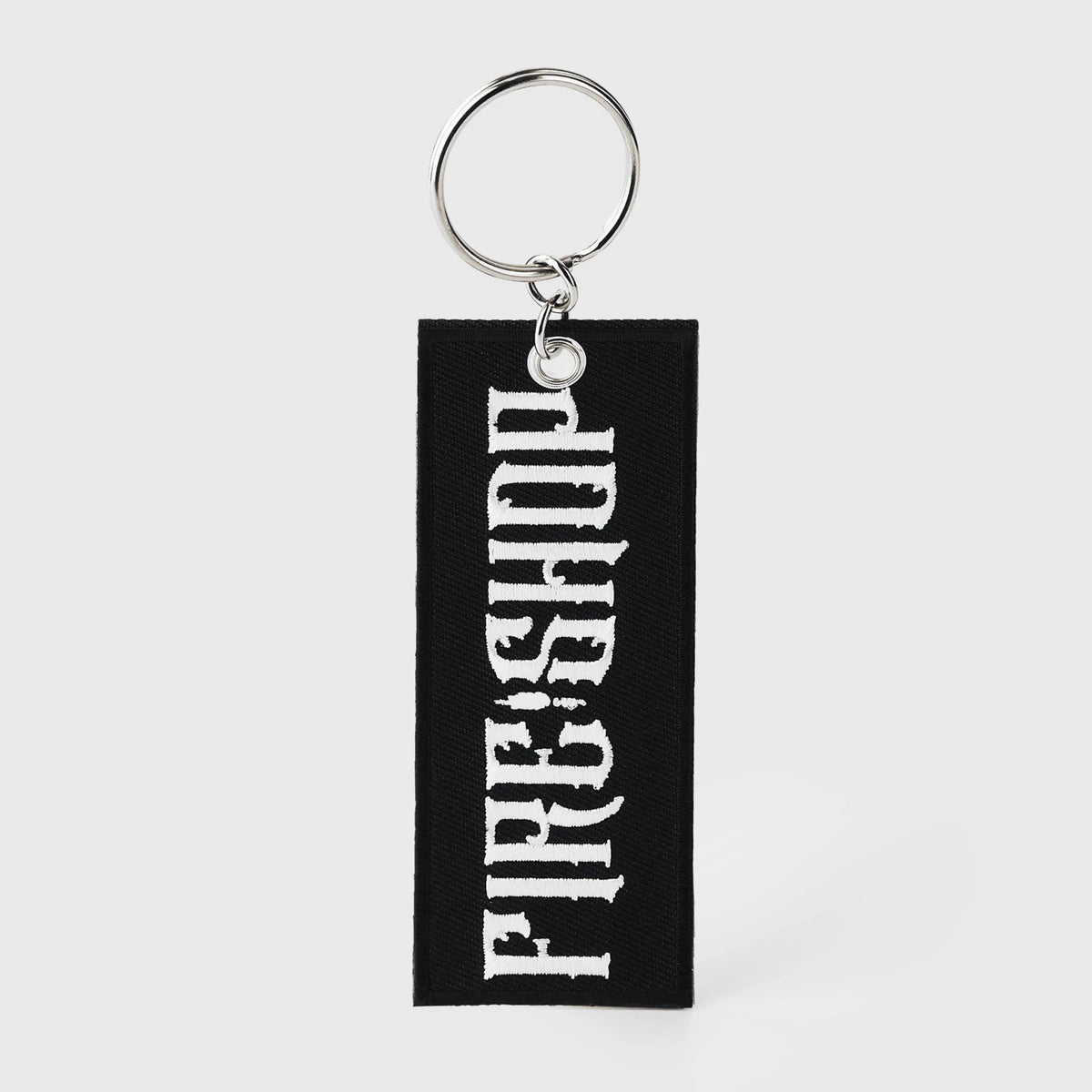 Pinlord.com THE/STUDIO Review manufacturer keychains featuring stylish, branded designs with the THE/STUDIO logo on durable metal keychains.