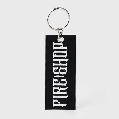 Pinlord.com THE/STUDIO Review manufacturer keychains featuring stylish, branded designs with the THE/STUDIO logo on durable metal keychains.