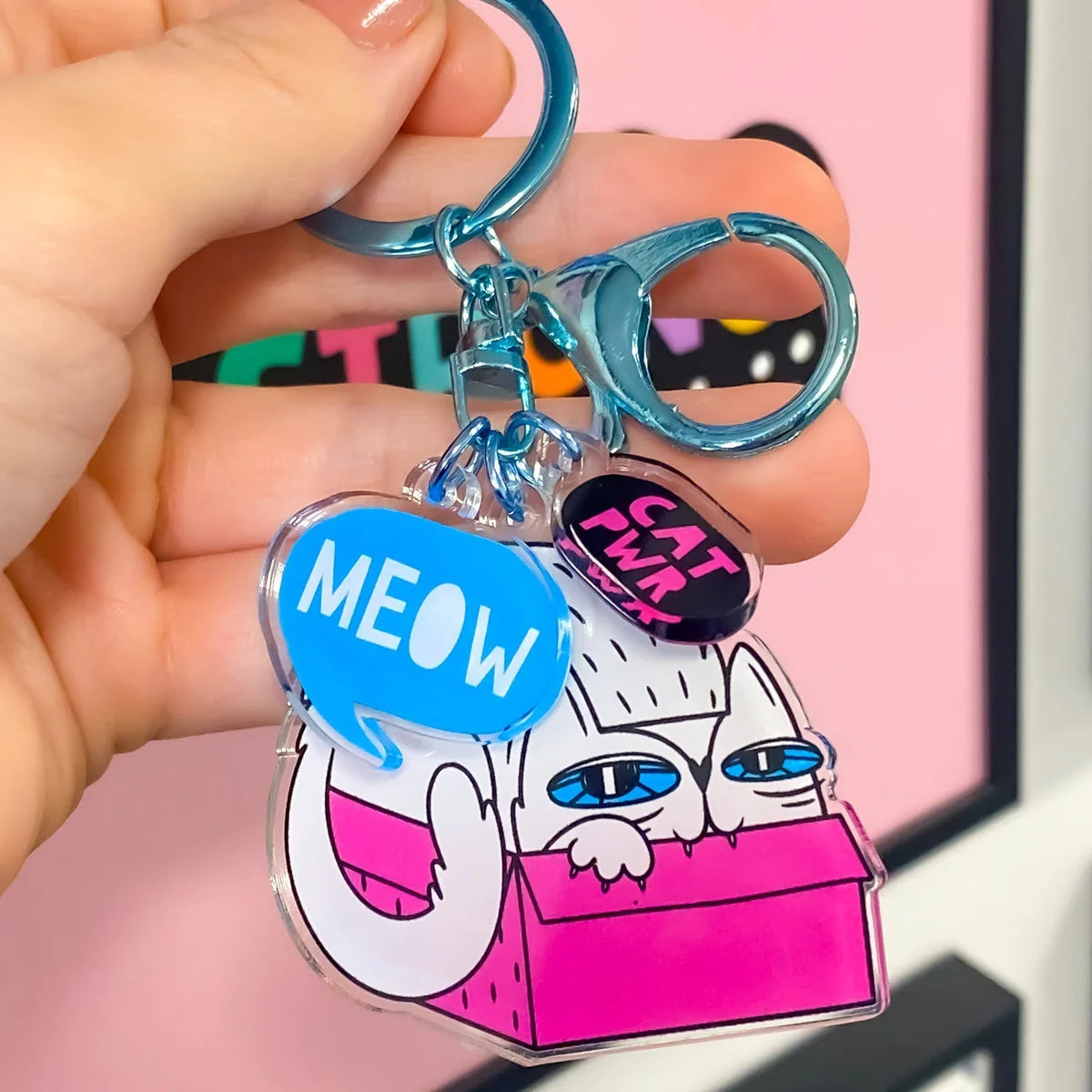 Clear acrylic keychains featuring Zap! Creatives Review design by Pinlord.com, double-layered and visually appealing.