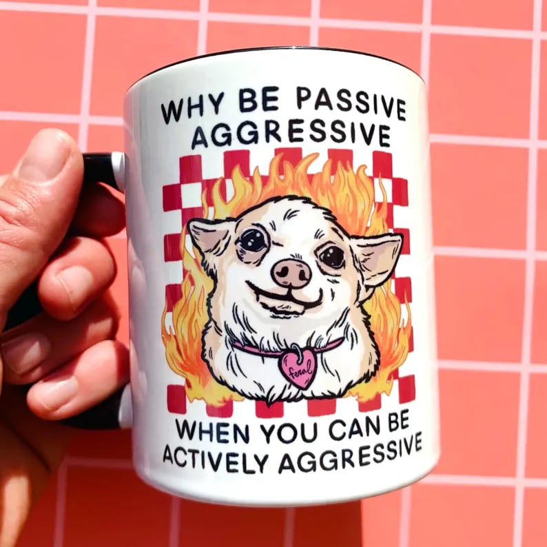 Custom ceramic mug with colorful design, featuring the Pinlord.com logo and personalized artwork on a white background.