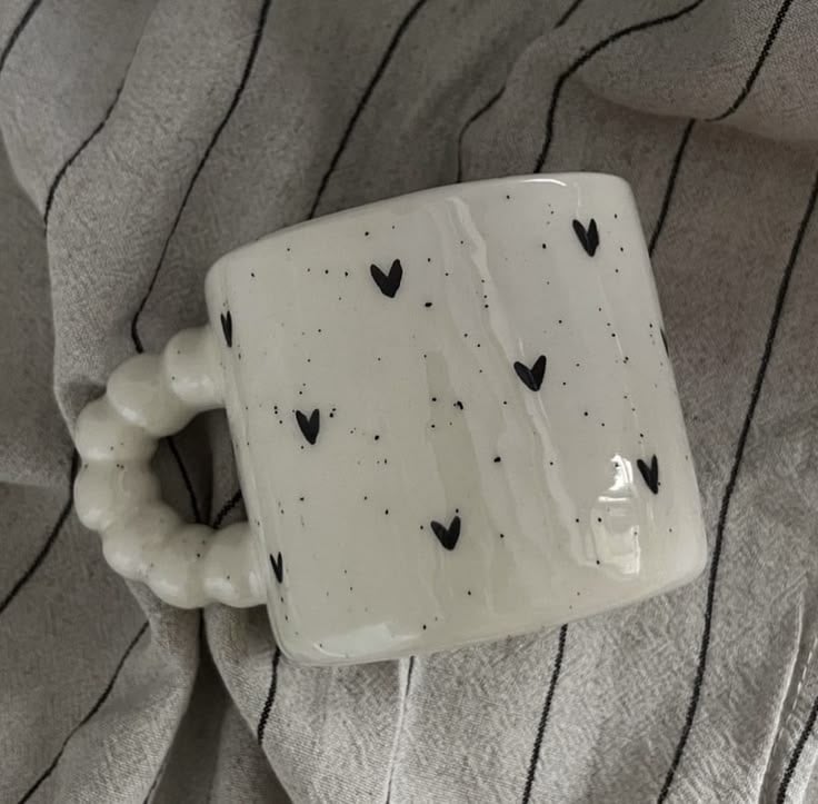 Custom mug with a creative design template from Pinlord.com, showcasing a stylish ceramic mug with personalized artwork.