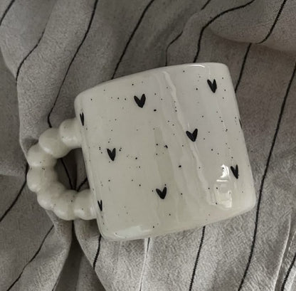 Custom mug with a creative design template from Pinlord.com, showcasing a stylish ceramic mug with personalized artwork.