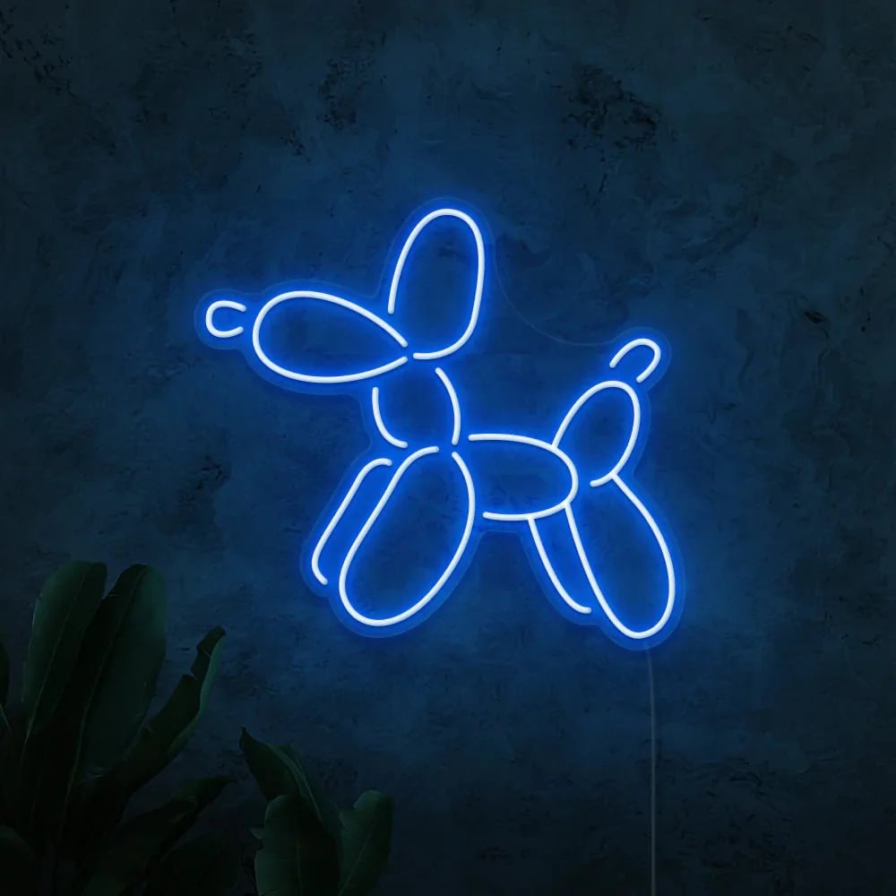 Custom neon sign by Pinlord.com with bright, colorful LED tubing spelling out a personalized message on a dark background.
