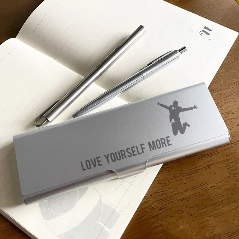 Custom pencil case from Pinlord.com with vibrant design, featuring a zipper closure and spacious interior for stationery storage.