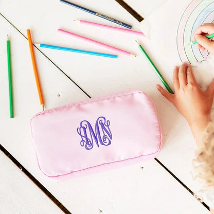 Custom pencil case by Pinlord.com with colorful design, featuring multiple compartments for organizing stationery supplies.