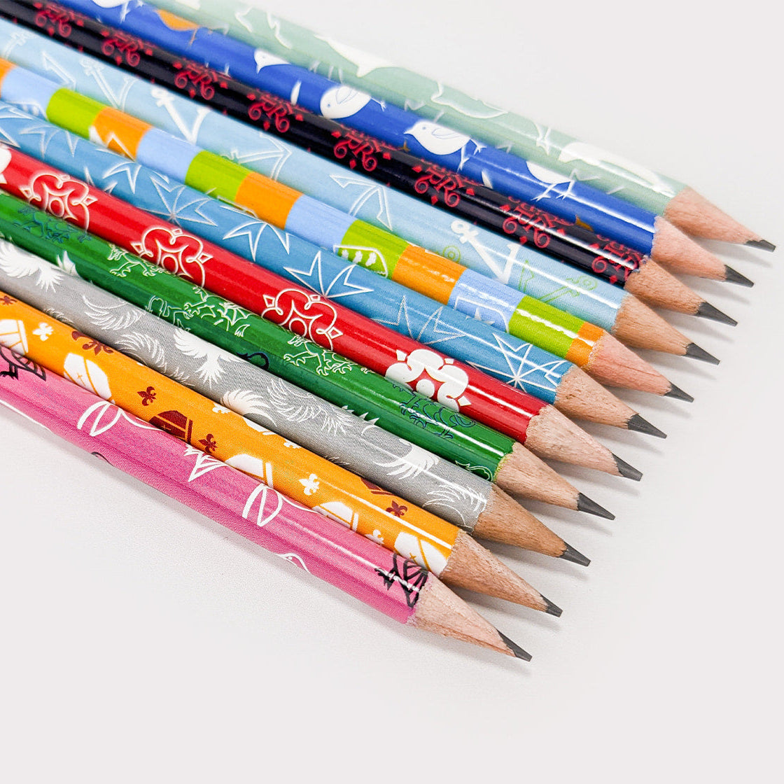 Custom printed pencils from Pinlord.com with colorful designs, perfect for personalized writing or promotional giveaways.
