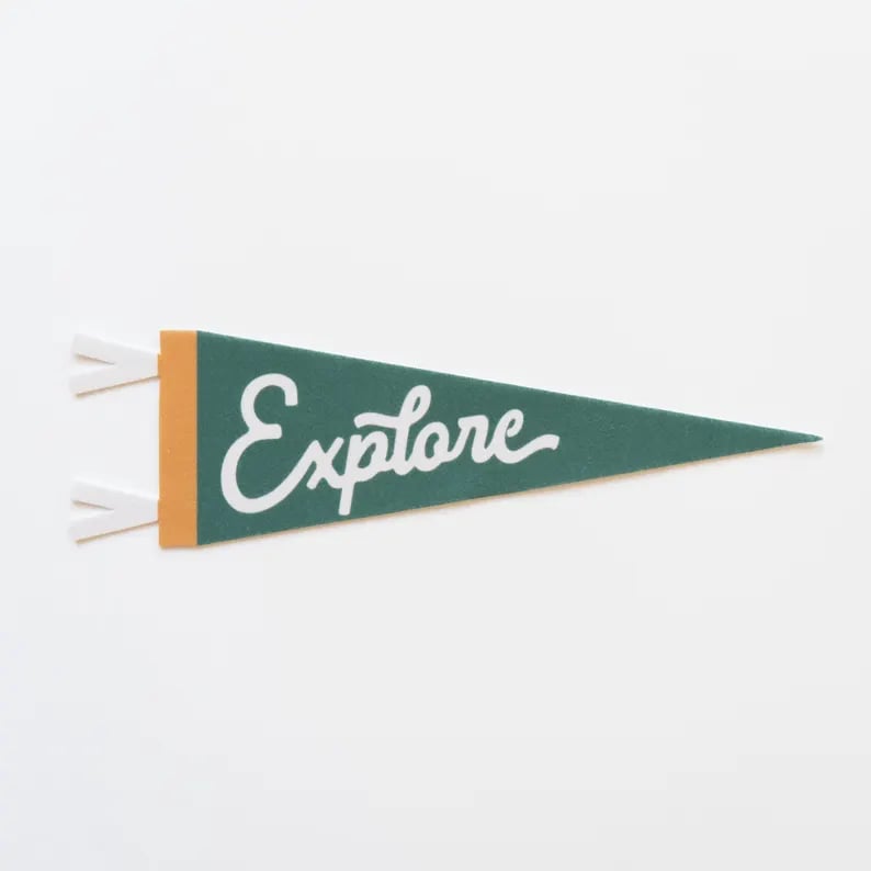 Custom pennants featuring vibrant designs, ideal for sports, events, or decoration, by Pinlord.com