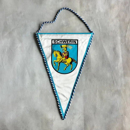 Custom Pennants featuring vibrant designs and bold lettering, perfect for personal or team celebrations.