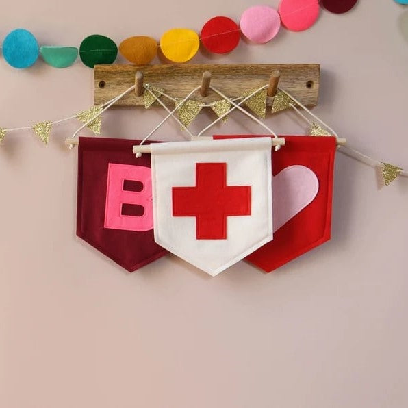 Custom pennants featuring vibrant colors and unique designs, perfect for sports teams, schools, or personal collections.