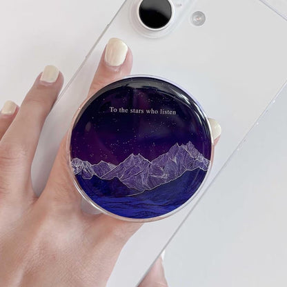 Custom Popsockets by Pinlord.com featuring personalized designs on a round phone grip accessory.
