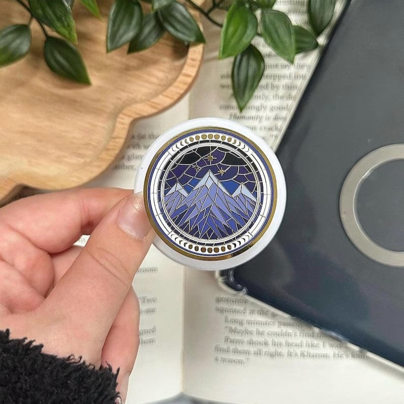 Custom Popsockets by Pinlord.com showing personalized design for phone grip and stand functionality.