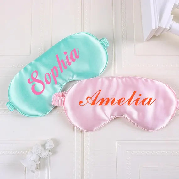 Black custom sleeping mask with adjustable strap from Pinlord.com, designed for comfortable sleep and light blocking.