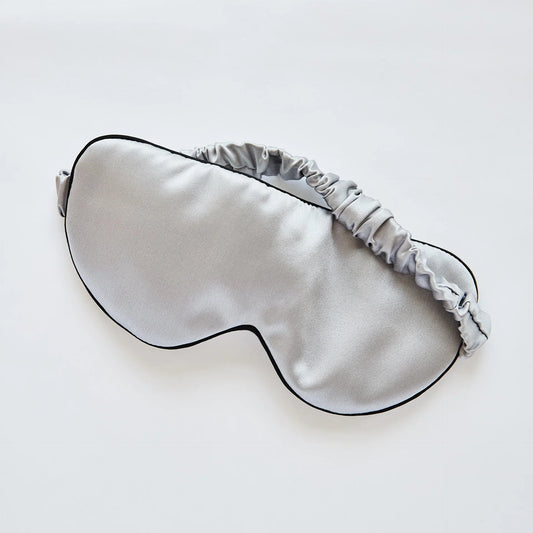 Custom sleeping mask with a creative design template from Pinlord.com, featuring colorful patterns and soft fabric.