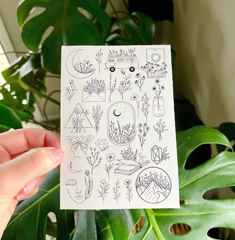 Custom temporary tattoo featuring intricate designs from Pinlord.com, showcasing a detailed, vibrant tattoo on skin.