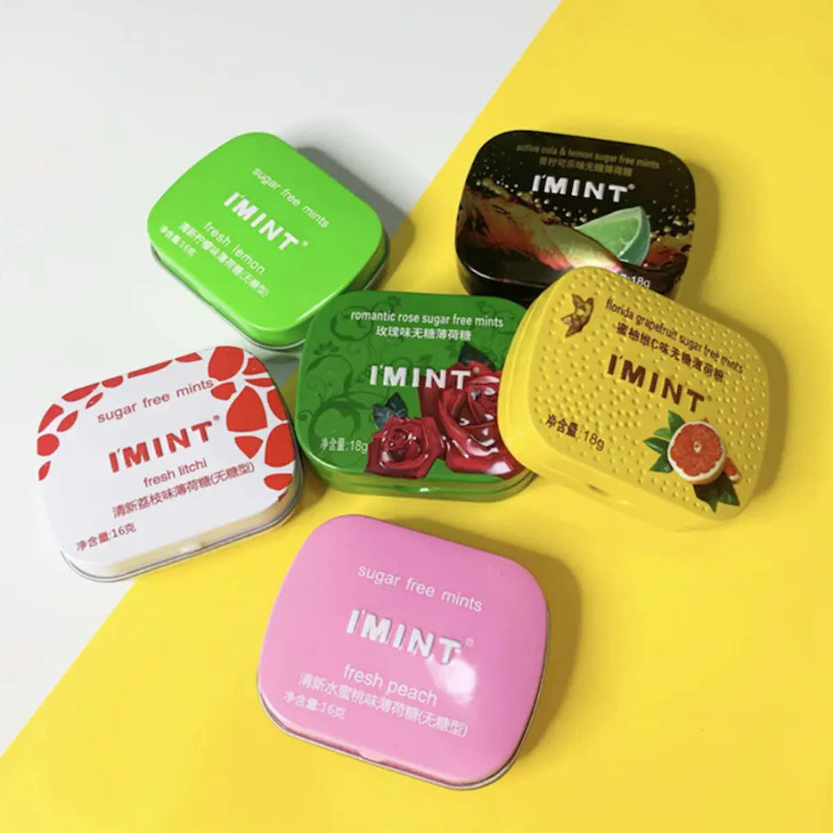 Custom tin cans featuring personalized designs, made by Pinlord.com, with a sleek metallic finish and customizable labels.