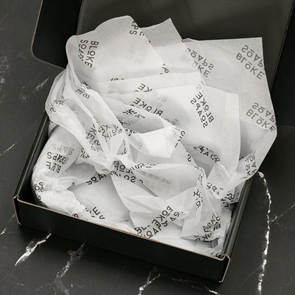 Decorative custom tissue paper with colorful patterns, ideal for gift wrapping and craft projects, by Pinlord.com.