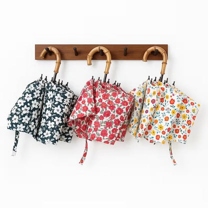Custom umbrella by Pinlord.com with colorful printed canopy and sturdy handle, ideal for personalized rain protection.