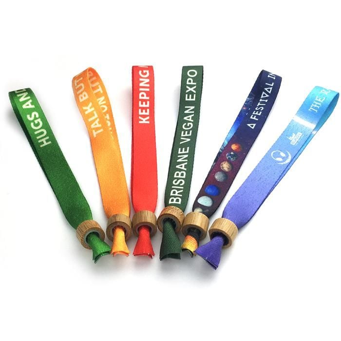 Custom wristbands from Pinlord.com featuring vibrant colors, adjustable straps, and personalized text for events and promotions.
