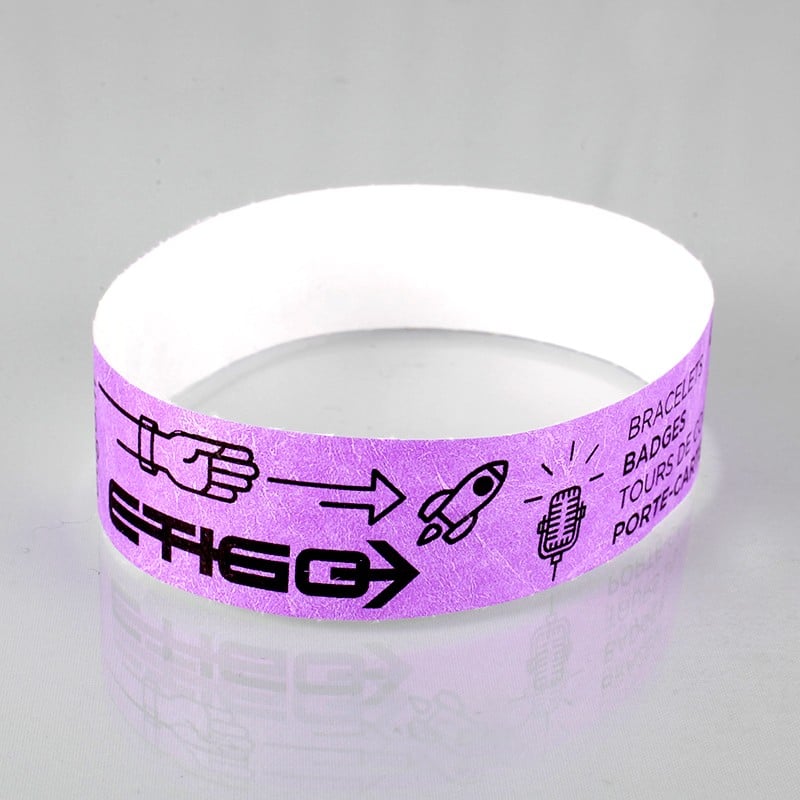Custom wristbands in vibrant colors with personalized text, made by Pinlord.com, perfect for events and team spirit.