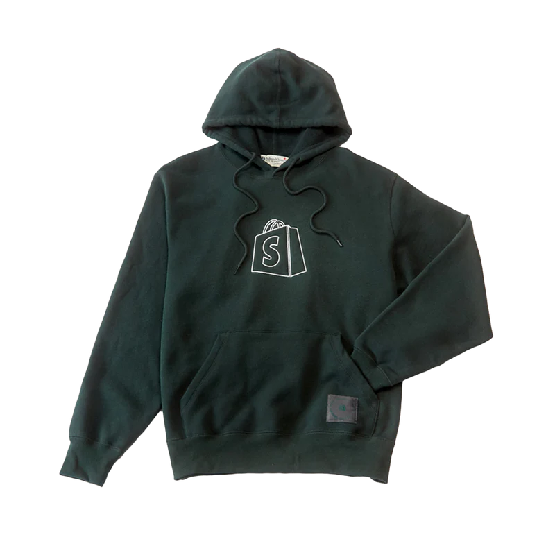 Custom merchandise project by Shopify and Pinlord inspiring entrepreneurs and fostering global innovation in a vibrant design.