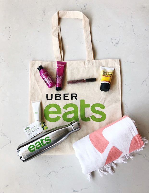 Uber Eats and Pinlord custom merchandise project showcasing branded food delivery experiences and unique food-themed accessories.