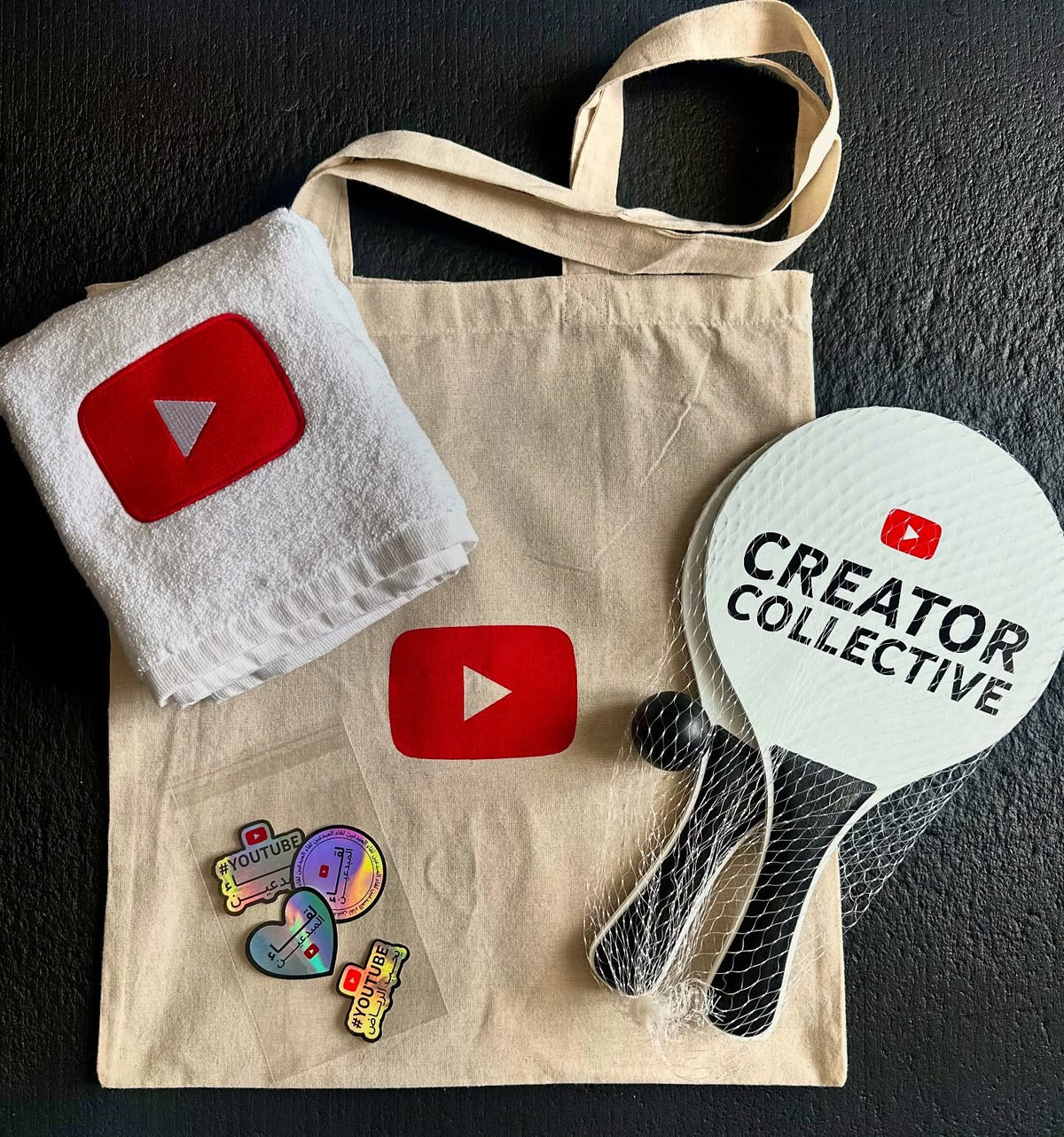 YouTube x Pinlord ShareSpace Reality Show custom merchandise project image showing branded designs and creative visuals.