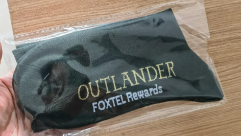 Foxtel project image showcasing premium custom subscriber gift packages with branding and colorful design elements.