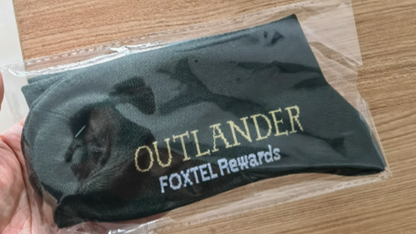 Foxtel project image showcasing premium custom subscriber gift packages with branding and colorful design elements.