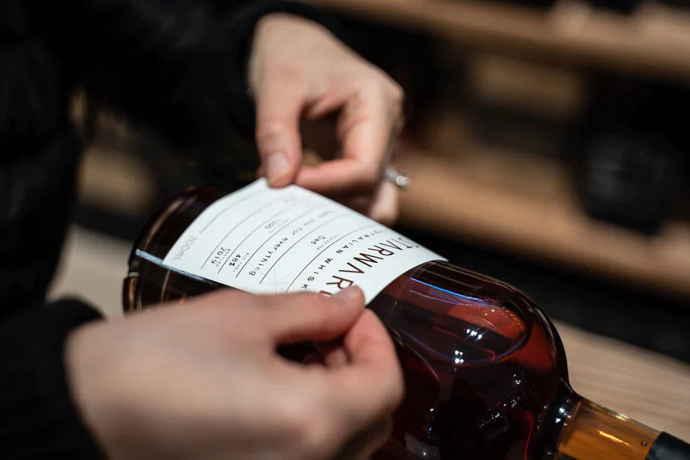 Starward Whiskey bottle label and premium product presentation by YourStuffMade.com